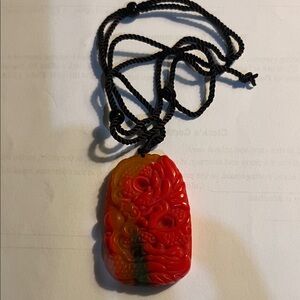 Multicolor Carved Pendant Necklace
2 feet’s long